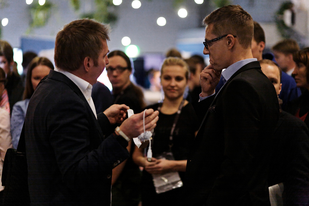 Christian Lindholm is introducing the Slush 2013 Health demo area to minister Alexander Stubb.