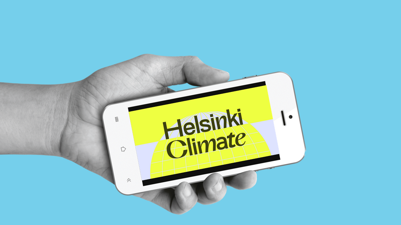 Kuvituskuva puhelimesta, jonka ruudulla näkyy Helsinki Climate -tapahtuman logo