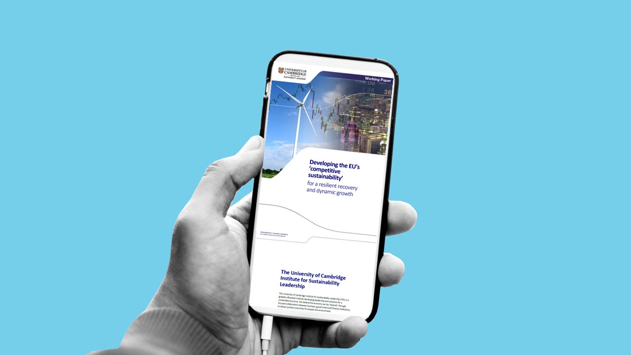 A hand holding a mobile phone scrolling a report